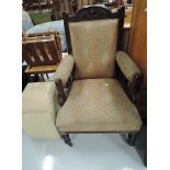 A 19th stained frame salon armchair