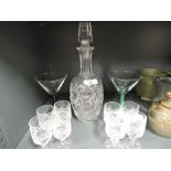 A cut and etched glass decanter with Scotch thistle design and crystal glass set