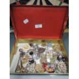 A selection of costume jewellery broaches pins and ties