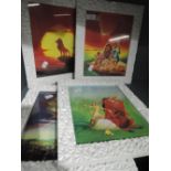 A selection Walt Disney Lion King prints in retro plastic frames