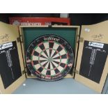 An as new Phil Taylor Dart board and score keeper