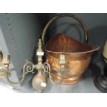 A vintage copper coal bucket and period brass light fitting