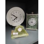 A selection of clocks including mantle and smiths wall mounted plate clock