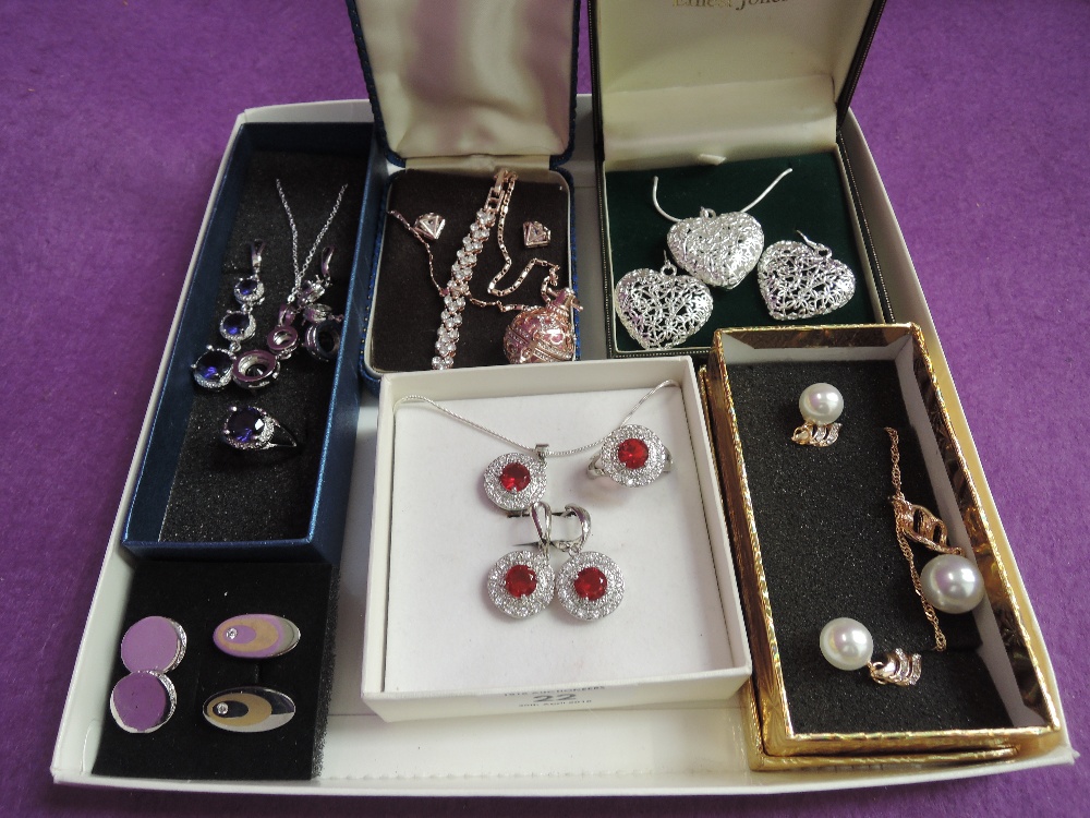 Five costume jewellery sets including wire hearts, and two pairs of cufflinks