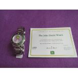 A Gents quartz John Deere wrist watch having a baton & dot dial to silvered face with logo and