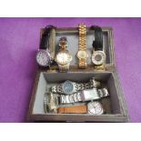 A small wooden box containing eight wrist watches including Zeitner, Everite ewtc