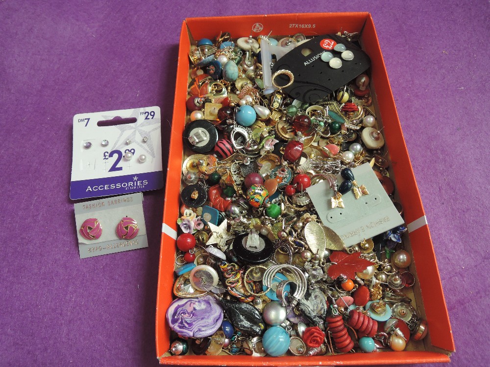 A large selection of costume earrings of various designs