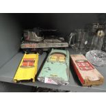 A selection of tin toy cars and anti air craft tank,