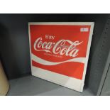 A vintage Coca Cola advertising sign double sided