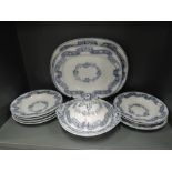 A vintage Minton Newstone part dinner service in the Wreath Ribbon pattern