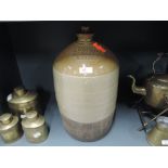 A vintage earthen ware salt glazed advertising flagon for Dunn Horse Hotel, Kendal