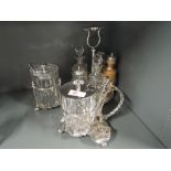A selection of vintage plated and cut glass sauce servers and cruet set