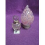 A clear cut glass scent or perfume bottle with HM silver top and art glass bauble