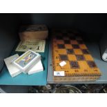 A selection of vintage board games including chess set