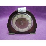 A vintage oak body mantle clock small size