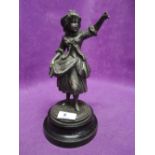 An early 20th century spelter figure of child in Sunday dress