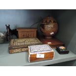 A selection of decorative wooden and inlay trinket boxes