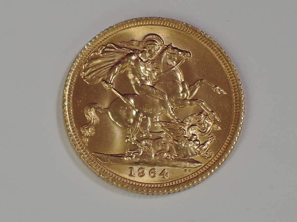 A gold 1964 Great Britain Elizabeth II Sovereign, in plastic case