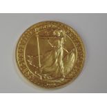 A gold 1oz 2000 Great Britain Britannia 100 pound coin, in plastic case