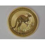 A gold 1oz 2017 100 dollar Australian Kangaroo coin, in plastic case