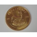 A gold 1oz 1978 South African Krugerrand coin, in plastic case