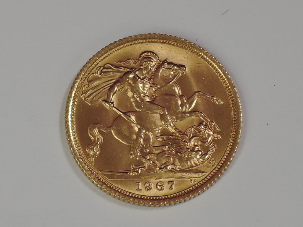 A gold 1967 Great Britain Elizabeth II Sovereign, in plastic case