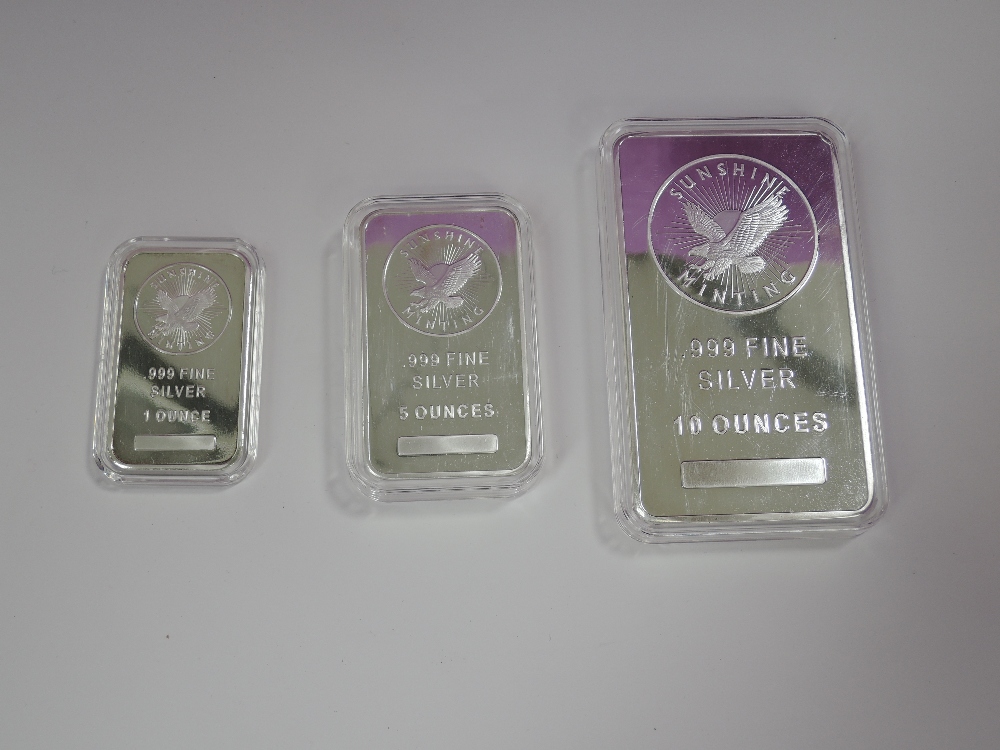 Three bars of Sunshine Minting silver consisting of .999 fine silver 10 ounce bar, .999 fine