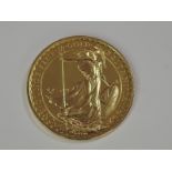 A gold 1oz 1992 Great Britain Britannia 100 pound coin, in plastic case