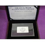 A 5oz silver bullion coin bar (one ounce silver 2016 dollar in centre of bar) in wood case with