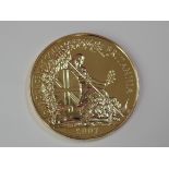 A gold 1oz 2007 Great Britain Britannia 100 pound coin, in plastic case