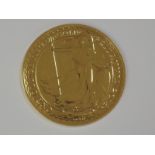A gold 1oz 2013 Great Britain Britannia 100 pound coin, in plastic case