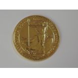 A gold 1oz 2014 Great Britain Britannia 100 pound coin, in plastic case