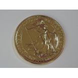 A gold 1oz 2012 Great Britain Britannia 100 pound coin, in plastic case