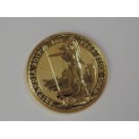 A gold 1oz 2017 Great Britain Britannia 100 pound coin, in plastic case