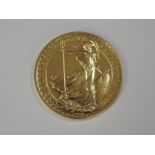 A gold 1oz 1996 Great Britain Britannia 100 pound coin, in plastic case