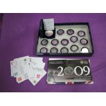 A collection of thirteen brilliant uncirculated 2011 silver London Olympic 50p coins, two missing