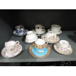 A selection of vintage tea cups and saucers including Dresden Royal Worcester etc