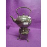 A vintage travellers spirit kettle in a gothic style