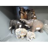 A selection of vintage heavy ethnic wooden elephants and similar