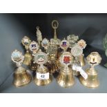 A selection of vintage brass bell keepsakes including Blackpool tower