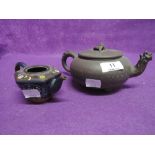 Two vintage oriental possibly Chinese tea pots, Cloisonne and eathern ware