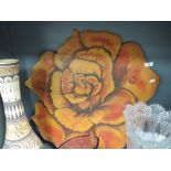 A vintage hand painted card sign or decoration in the form of a large flower