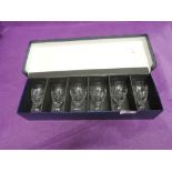 A set of vintage crystal cut spirit glasses