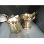 A vintage brass cast apothecary mortar and similar brass bell