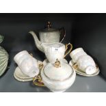 A vintage coffee service with lustre glaze