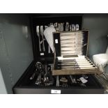 An as new canteen of cutlery by Viners and similar knife and fork set