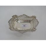 A Victorian silver trinket dish of shaped rectangular form having pierced decoration and moulded