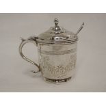 An Edwardian silver mustard of lidded tankard form having ribbon and floral swag engraved decoration