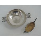 A silver quaich of plain form having moulded handles commemorating George VI coronation, London