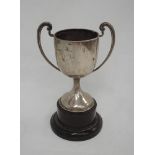 A small silver goblet trophy with stand of plain form with no inscription, Birmingham 1935, makers